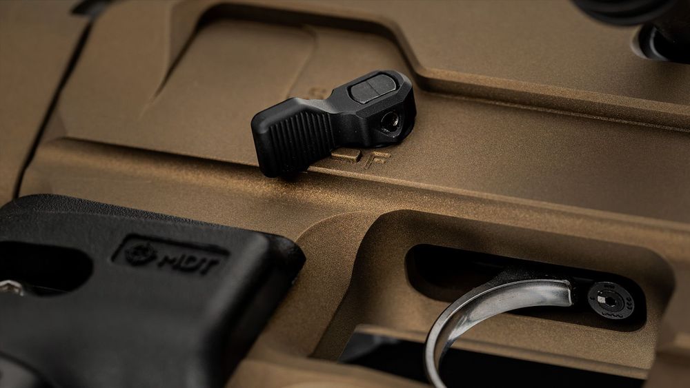 Extended safety lever