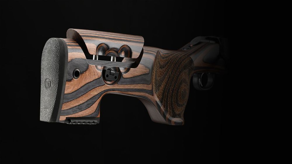 Laminated wood stock with adjustable cheek piece